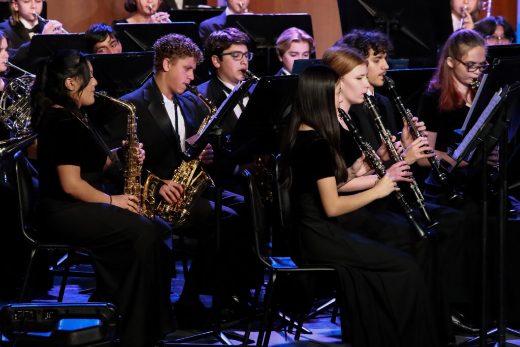 Students perform at a band concert.