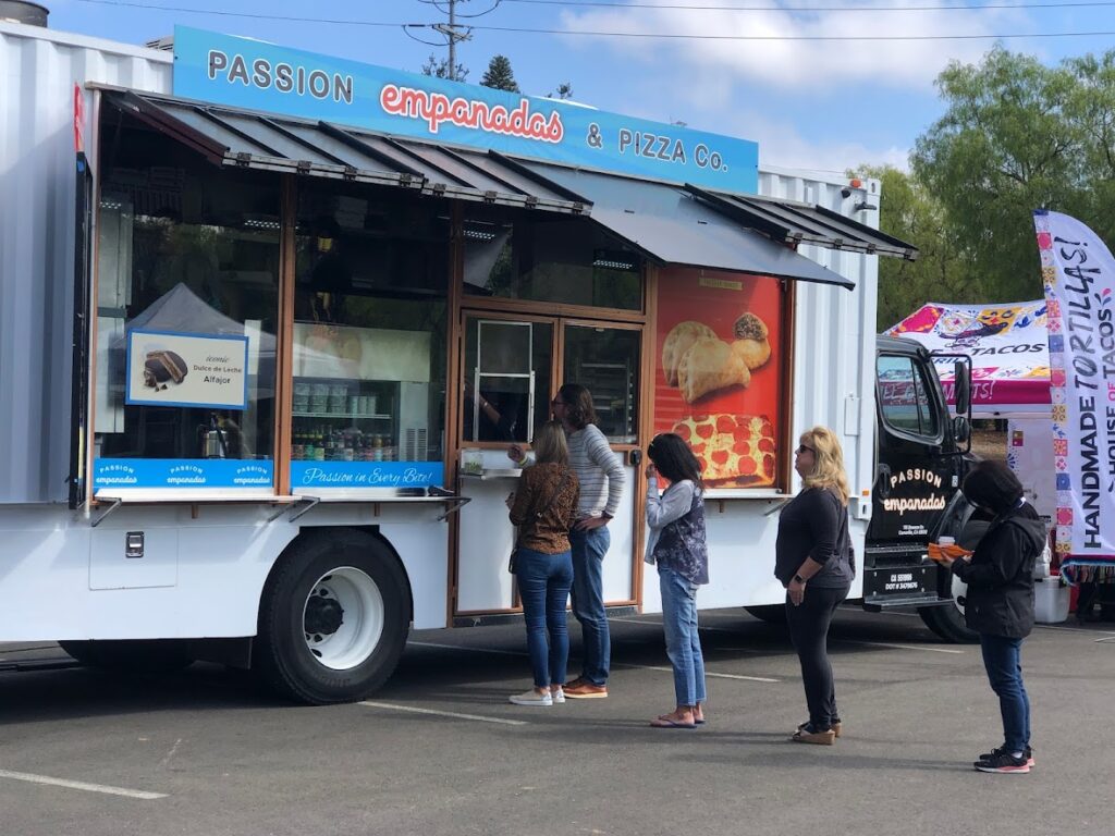 customers order food from a food truck